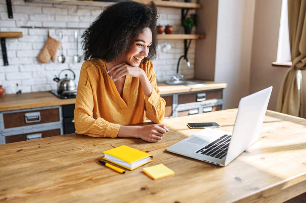 Female CHRO sits at her laptop